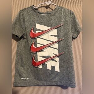 Nike Kids Gray Tee with Red Swoosh Design